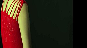 魅力的な胸を持つ見事な女性が、誘惑的な赤いドレスを着て挑発的なポーズであなたを誘惑します。
